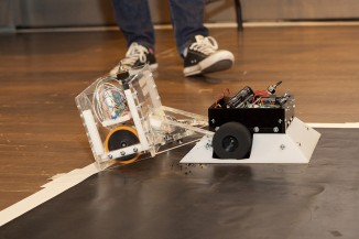 Two battle bots square off in Robot Sumo