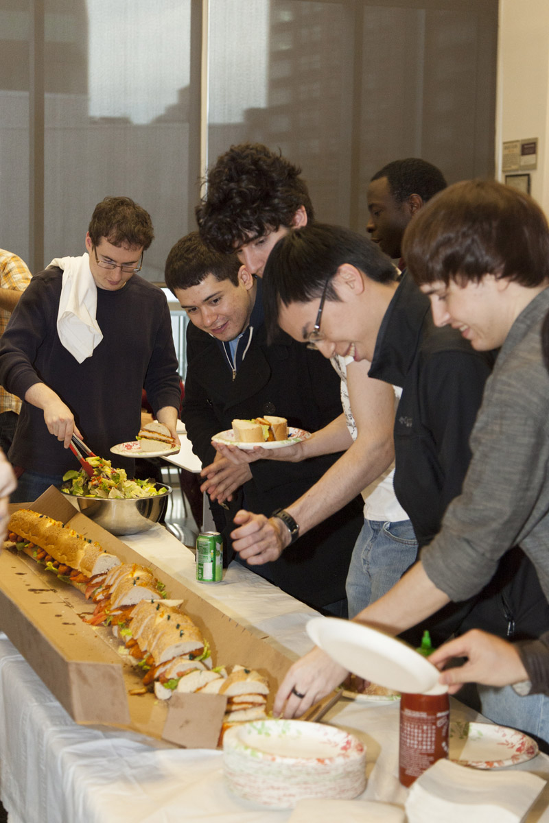 Students celebrate the end of Student Engagement and Philanthropy Week with sandwiches and cake